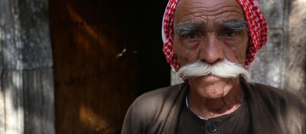 Iraqi Yazidi worshippers arrive at the Lalish temple in a valley near the Kurdish city of Dohuk, 430 km (260 miles) northwest of Baghdad, on May 21, 2015. - Sputnik International