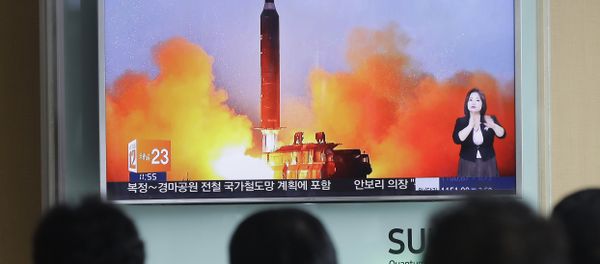 People watch a TV news channel airing an image of North Korea's ballistic missile launch published in North Korea's Rodong Sinmun newspaper at the Seoul Railway Station in Seoul. (File) People watch a TV news channel airing an image of North Korea's ballistic missile launch published in North Korea's Rodong Sinmun newspaper at the Seoul Railway Station in Seoul. (File) - Sputnik International