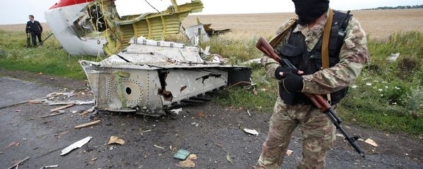 A member of self-defense unit stands at the crash site of Malaysia Airlines flight MH17, near the village of Hrabove (Grabovo) in Donetsk region, Ukraine. (File) A member of self-defense unit stands at the crash site of Malaysia Airlines flight MH17, near the village of Hrabove (Grabovo) in Donetsk region, Ukraine. (File) - Sputnik International