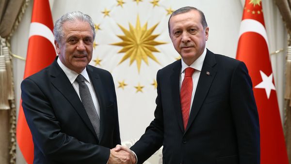 Turkish President Recep Tayyip Erdogan, right, and European Commissioner for Migration Dimitris Avramopoulos shake hands before a meeting in Ankara, Turkey, Monday, April 4, 2016. Turkish President Recep Tayyip Erdogan, right, and European Commissioner for Migration Dimitris Avramopoulos shake hands before a meeting in Ankara, Turkey, Monday, April 4, 2016. - Sputnik International
