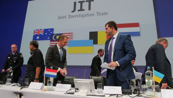 Presentation of a report in Nieuwegein on the investigation results of Malaysia Airlines Boeing 777 (flight MH17) crash in eastern Ukraine in 2014. First Deputy Prosecutor General of Ukraine Dmytro Storozhuk, second right - Sputnik International
