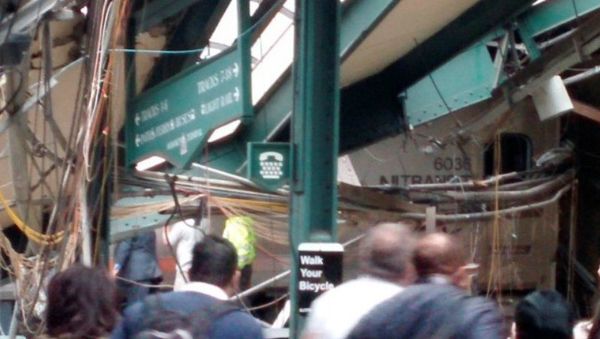 Onlookers view a New Jersey Transit train that derailed and crashed through the station in Hoboken, New Jersey, U.S. in this picture courtesy of Chris Lantero taken September 29, 2016 Onlookers view a New Jersey Transit train that derailed and crashed through the station in Hoboken, New Jersey, U.S. in this picture courtesy of Chris Lantero taken September 29, 2016 - Sputnik International