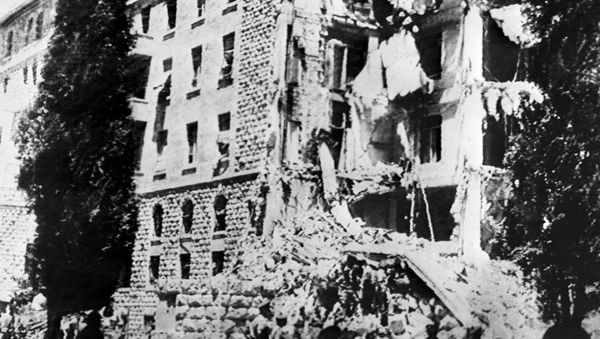 A picture taken 22 July 1946 shows the King David Hotel in Jerusalem, which housed the British Headquarters, damaged after a bombing attack against the British government by members of Irgun, a Zionist terrorist group headed by Menachem Begin. - Sputnik International