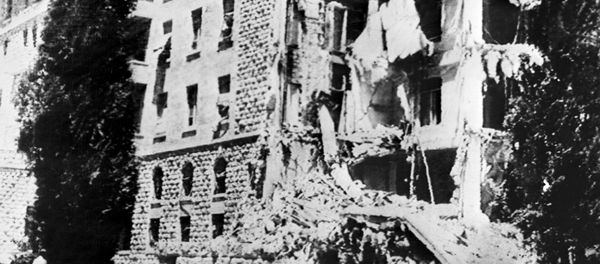 A picture taken 22 July 1946 shows the King David Hotel in Jerusalem, which housed the British Headquarters, damaged after a bombing attack against the British government by members of Irgun, a Zionist terrorist group headed by Menachem Begin. - Sputnik International