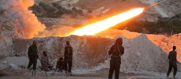 Free Syrian Army fighters launch a Grad rocket from Halfaya town in Hama province (File) Free Syrian Army fighters launch a Grad rocket from Halfaya town in Hama province (File) - Sputnik International