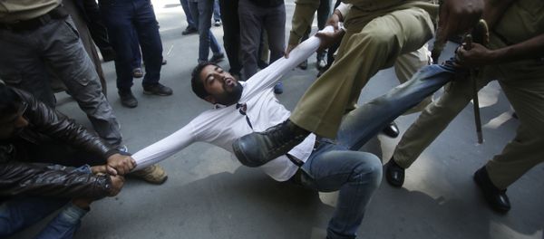 Indian policemen try to detain a supporter of Jammu and Kashmir state lawmaker, Engineer Abdul Rashid Sheikh, during a protest in Srinagar, Indian controlled Kashmir, Monday, Sept. 26, 2016 Indian policemen try to detain a supporter of Jammu and Kashmir state lawmaker, Engineer Abdul Rashid Sheikh, during a protest in Srinagar, Indian controlled Kashmir, Monday, Sept. 26, 2016 - Sputnik International