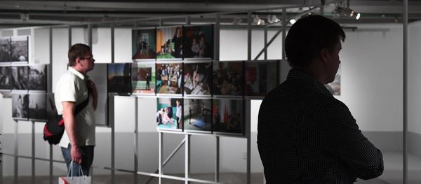 Visitors at the exhibition by winners of the Andrei Stenin International Press Photo Contest - Sputnik International