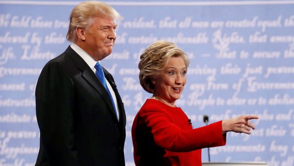 Republican US presidential nominee Donald Trump and Democratic U.S. presidential nominee Hillary Clinton look on at the start of their first presidential debate at Hofstra University in Hempstead, New York, US, September 26, 2016. - Sputnik International