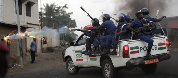 Burundi riot police fire tear gas as they chase demonstrators during clashes in Bujumbura, Burundi, Wednesday April 29, 2015 Burundi riot police fire tear gas as they chase demonstrators during clashes in Bujumbura, Burundi, Wednesday April 29, 2015 - Sputnik International