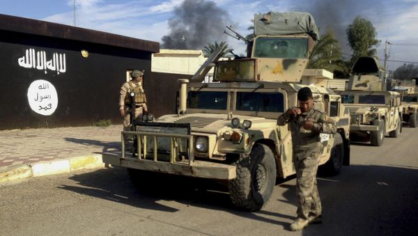 Iraqi army soldiers deploy in front of a court run by the Islamic State group after a military operation to regain control of the town of Sadiyah in Diyala province, 60 miles (95 kilometers) north of Baghdad, Iraq (File) Iraqi army soldiers deploy in front of a court run by the Islamic State group after a military operation to regain control of the town of Sadiyah in Diyala province, 60 miles (95 kilometers) north of Baghdad, Iraq (File) - Sputnik International