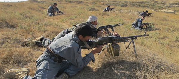Afghan National Army soldiers take positions during a joint operation by ISAF and ANSF against taliban in Kunduz province, north of Kabul, Afghanistan (File) - Sputnik International