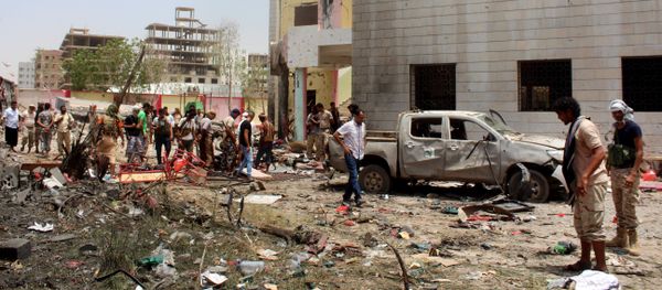 Fighters loyal to the government gather at the site of a suicide car bombing in Yemen’s southern city of Aden, Yemen, Monday, Aug. 29, 2016 Fighters loyal to the government gather at the site of a suicide car bombing in Yemen’s southern city of Aden, Yemen, Monday, Aug. 29, 2016 - Sputnik International