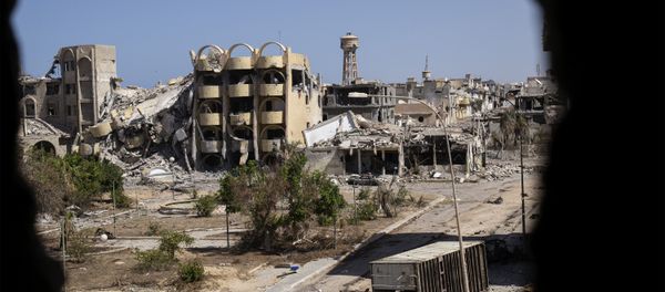 A general view shows destroyed buildings in the District 3 neighbourhood of Sirte, the last stronghold of Islamic State (IS) group in the coastal Libyan city, on September 29, 2016 - Sputnik International