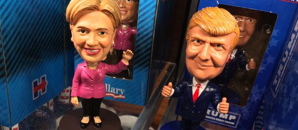 Bobblehead dolls depicting Democratic presidential nominee Hillary Clinton and her Republican counterpart Donald Trump are seen Septmber 29, 2016 at Ronald Reagan National Airport in Arlington, Virginia Bobblehead dolls depicting Democratic presidential nominee Hillary Clinton and her Republican counterpart Donald Trump are seen Septmber 29, 2016 at Ronald Reagan National Airport in Arlington, Virginia - Sputnik International