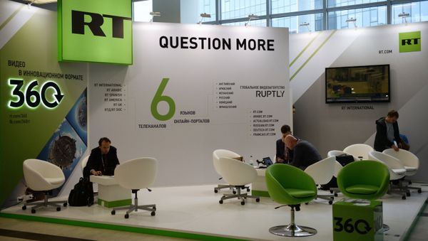 The Russia Today TV channel stand at the Eastern Economic Forum The Russia Today TV channel stand at the Eastern Economic Forum - Sputnik International