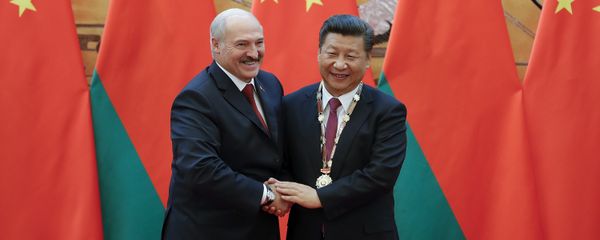 Chinese President Xi Jinping (R) shakes hands with Belarus' President Alexander Lukashenko after being awarding the Belarus peace and friendship medal at the Great Hall of the People in Beijing on September 29, 2016 Chinese President Xi Jinping (R) shakes hands with Belarus' President Alexander Lukashenko after being awarding the Belarus peace and friendship medal at the Great Hall of the People in Beijing on September 29, 2016 - Sputnik International