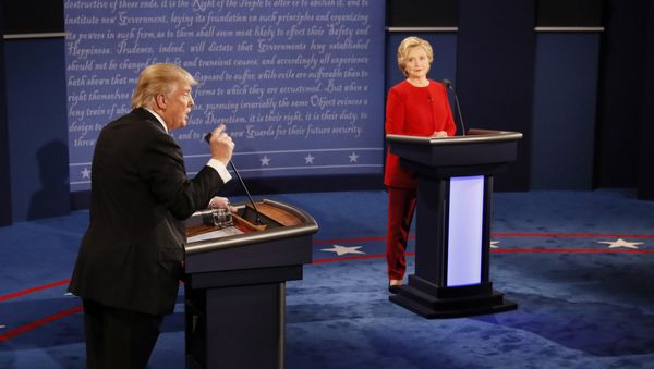 Republican presidential nominee Donald Trump gestures during the presidential debate with Democratic presidential nominee Hillary Clinton at Hofstra University in Hempstead, N.Y., Monday, Sept. 26, 2016 - Sputnik International