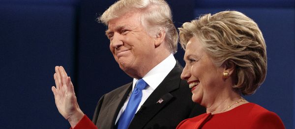 Republican presidential candidate Donald Trump, left, stands with Democratic presidential candidate Hillary Clinton at the first presidential debate at Hofstra University, Monday, Sept. 26, 2016, in Hempstead, N.Y. Republican presidential candidate Donald Trump, left, stands with Democratic presidential candidate Hillary Clinton at the first presidential debate at Hofstra University, Monday, Sept. 26, 2016, in Hempstead, N.Y. - Sputnik International