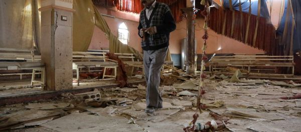 A man inspects the damage at a wedding hall a day after a suicide attack targeted a Kurdish wedding party in the village of Tall Tawil in the Syrian Hasakeh province A man inspects the damage at a wedding hall a day after a suicide attack targeted a Kurdish wedding party in the village of Tall Tawil in the Syrian Hasakeh province - Sputnik International
