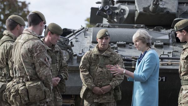 Prime Minister Theresa May greets troops as she visits 1st Battalion The Mercian Regiment (Cheshire, Worcesters and Foresters, and Staffords) at their barracks at Bulford Camp on September 29, 2016 near Salisbury, England. The Prime Minister visited the military base in the Salisbury Plain area to meet with soldiers, see the equipment they work with and to also meet with some their families Prime Minister Theresa May greets troops as she visits 1st Battalion The Mercian Regiment (Cheshire, Worcesters and Foresters, and Staffords) at their barracks at Bulford Camp on September 29, 2016 near Salisbury, England. The Prime Minister visited the military base in the Salisbury Plain area to meet with soldiers, see the equipment they work with and to also meet with some their families - Sputnik International