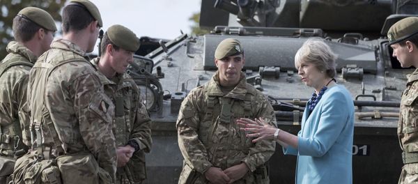 Prime Minister Theresa May greets troops as she visits 1st Battalion The Mercian Regiment (Cheshire, Worcesters and Foresters, and Staffords) at their barracks at Bulford Camp on September 29, 2016 near Salisbury, England. The Prime Minister visited the military base in the Salisbury Plain area to meet with soldiers, see the equipment they work with and to also meet with some their families - Sputnik International