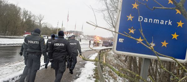 Police officers walk at the Danish-German border in Krusaa, Denmark Police officers walk at the Danish-German border in Krusaa, Denmark - Sputnik International