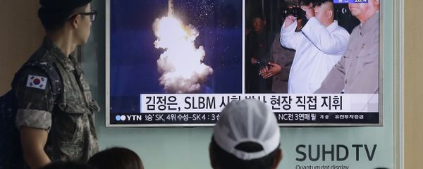 South Korean army soldier watches a TV news program showing images published in North Korea's Rodong Sinmun newspaper of North Korea's ballistic missile believed to have been launched from underwater and North Korean leader Kim Jong-un, at Seoul Railway station in Seoul, South Korea (File) South Korean army soldier watches a TV news program showing images published in North Korea's Rodong Sinmun newspaper of North Korea's ballistic missile believed to have been launched from underwater and North Korean leader Kim Jong-un, at Seoul Railway station in Seoul, South Korea (File) - Sputnik International