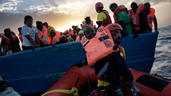 A child from African origin is rescued from a distressed vessel by a member of Proactiva Open Arms NGO in the mediteranean sea some 20 nautical miles north of Libya on October 3, 2016 A child from African origin is rescued from a distressed vessel by a member of Proactiva Open Arms NGO in the mediteranean sea some 20 nautical miles north of Libya on October 3, 2016 - Sputnik International