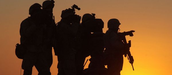 U.S. Marines scan the northwest perimeter of the American military compound at Afghanistan's Kandahar airport using sophisticated thermal imagery equipment, while Marines in light armored vehicles, supported by U.S. special forces and helicopters, search houses outside the perimeter of the airfield, Monday Jan. 14, 2002 U.S. Marines scan the northwest perimeter of the American military compound at Afghanistan's Kandahar airport using sophisticated thermal imagery equipment, while Marines in light armored vehicles, supported by U.S. special forces and helicopters, search houses outside the perimeter of the airfield, Monday Jan. 14, 2002 - Sputnik International