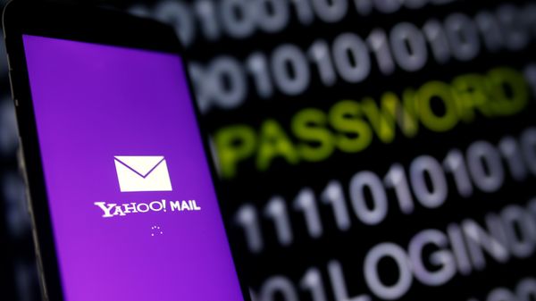 Yahoo Mail logo is displayed on a smartphone's screen in front of a code in this illustration taken in October 6, 2016. - Sputnik International