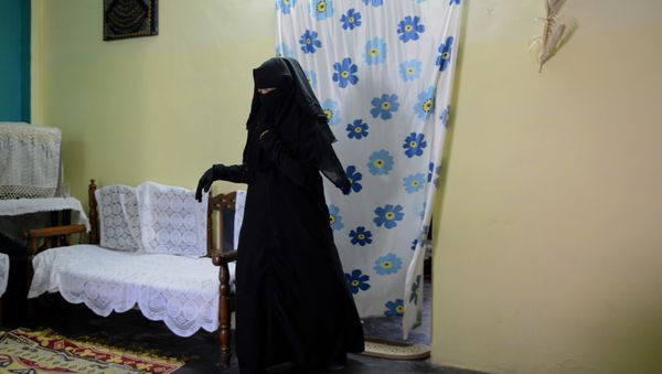 In this photograph taken on April 28, 2016, Shaista Ali, 26, at her house in Bhopal. Only three words were scrawled on the letter from her husband and posted to her parent's home in central India, but they were enough to shatter Sadaf Mehmood's life. Using an ancient and controversial Islamic practice, Mehmood's husband wrote talaq, talaq, talaq or I divorce you three times in Arabic, instantly ending his marriage of five years In this photograph taken on April 28, 2016, Shaista Ali, 26, at her house in Bhopal. Only three words were scrawled on the letter from her husband and posted to her parent's home in central India, but they were enough to shatter Sadaf Mehmood's life. Using an ancient and controversial Islamic practice, Mehmood's husband wrote talaq, talaq, talaq or I divorce you three times in Arabic, instantly ending his marriage of five years - Sputnik International