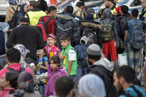 Migrants arrive at the railway station in Munich, southern Germany, on September 12, 2015 - Sputnik International