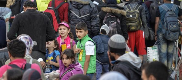 Migrants arrive at the railway station in Munich, southern Germany, on September 12, 2015 Migrants arrive at the railway station in Munich, southern Germany, on September 12, 2015 - Sputnik International