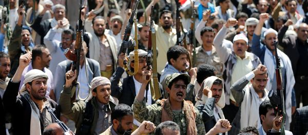 Armed people demonstrate outside the United Nations offices against Saudi-led air strikes on funeral hall in Sanaa, the capital of Yemen, October 9, 2016 Armed people demonstrate outside the United Nations offices against Saudi-led air strikes on funeral hall in Sanaa, the capital of Yemen, October 9, 2016 - Sputnik International