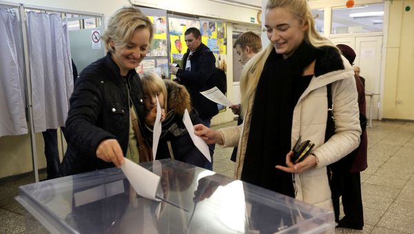 People cast their votes during general election in Vilnius, Lithuania, October 9, 2016 People cast their votes during general election in Vilnius, Lithuania, October 9, 2016 - Sputnik International