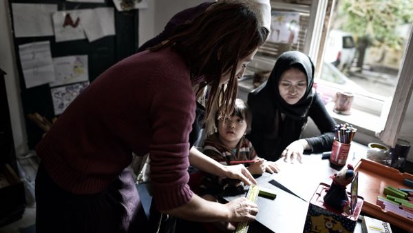 A greek squatter teaches at a school at the prosfygika complex in central Athens (File) A greek squatter teaches at a school at the prosfygika complex in central Athens (File) - Sputnik International