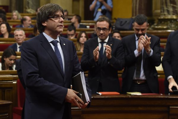 President of the Catalan regional Government Carles Puigdemont leaves after a debate on the government's question of confidence at the Parliament of Catalonia in Barcelona on September 29, 2016 President of the Catalan regional Government Carles Puigdemont leaves after a debate on the government's question of confidence at the Parliament of Catalonia in Barcelona on September 29, 2016 - Sputnik International