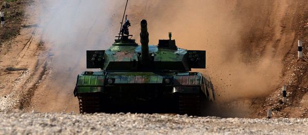 A ZTZ99 Main Battle Tank of China's team competes during ‘tank biathlon’, a paramilitary international competition with armor races and precision gunnery near Alabino, outside Moscow, on August 4, 2014 A ZTZ99 Main Battle Tank of China's team competes during ‘tank biathlon’, a paramilitary international competition with armor races and precision gunnery near Alabino, outside Moscow, on August 4, 2014 - Sputnik International