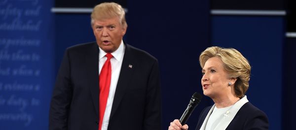 US Democratic presidential candidate Hillary Clinton and US Republican presidential candidate Donald Trump debate during the second presidential debate at Washington University in St. Louis, Missouri, on October 9, 2016 US Democratic presidential candidate Hillary Clinton and US Republican presidential candidate Donald Trump debate during the second presidential debate at Washington University in St. Louis, Missouri, on October 9, 2016 - Sputnik International