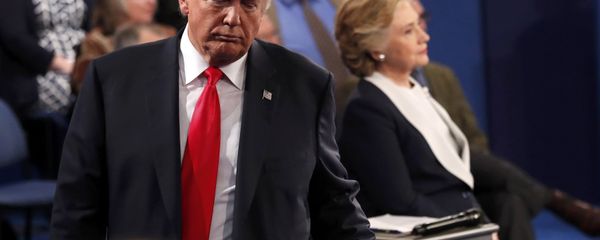 Republican U.S. presidential nominee Donald Trump and Democratic U.S. presidential nominee Hillary Clinton pause during their presidential town hall debate at Washington University in St. Louis, Missouri, U.S., October 9, 2016 Republican U.S. presidential nominee Donald Trump and Democratic U.S. presidential nominee Hillary Clinton pause during their presidential town hall debate at Washington University in St. Louis, Missouri, U.S., October 9, 2016 - Sputnik International