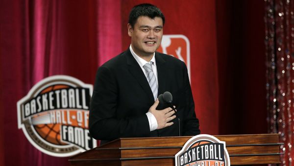 Basketball Hall of Fame indcutee Yao Ming puts his hand on his chest near his heart as he speaks during induction ceremonies, Friday, Sept. 9, 2016, in Springfield, Mass - Sputnik International