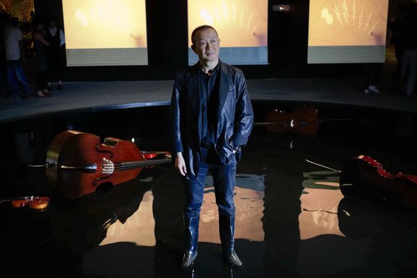 Chinese composer Tan Dun poses in a pool with chord instruments used for a performance as part of the Chinese pavilion 'Other Future' during the 56th Biennale of Arts in Venice, Thursday, May 7, 2015 Chinese composer Tan Dun poses in a pool with chord instruments used for a performance as part of the Chinese pavilion 'Other Future' during the 56th Biennale of Arts in Venice, Thursday, May 7, 2015 - Sputnik International