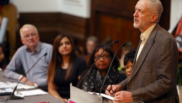 Britain's Opposition Labour Party leader Jeremy Corbyn (R) speaks at a Stand Up To Racism rally in London, Britain October 8, 2016. - Sputnik International