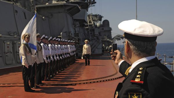 Russia's nuclear-powered missile cruiser Pyotr Veliky navy sailors attend a greeting ceremony for the Russian official delegation at Syria's Mediterranean port of Tartus.File photo - Sputnik International