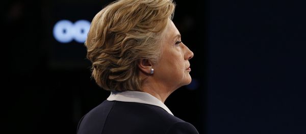 Democratic presidential nominee Hillary Clinton looks on during the second presidential debate at Washington University in St. Louis, Missouri on October 9, 2016. - Sputnik International