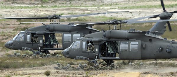 U.S. Army Black Hawk helicopters support soldiers during the NATO Noble Jump exercise on a training range near Swietoszow Zagan, Poland. Polish leaders say the country is buying Polish-made Black Hawk helicopters as it modernizes the army. U.S. Army Black Hawk helicopters support soldiers during the NATO Noble Jump exercise on a training range near Swietoszow Zagan, Poland. Polish leaders say the country is buying Polish-made Black Hawk helicopters as it modernizes the army. - Sputnik International