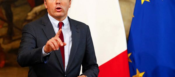 Italian Prime Minister Matteo Renzi gestures as he talks during a news conference at Chigi Palace in Rome, Italy October 12, 2016. Italian Prime Minister Matteo Renzi gestures as he talks during a news conference at Chigi Palace in Rome, Italy October 12, 2016. - Sputnik International