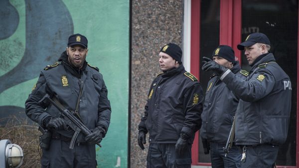 Policemen stand in front of a house in Ishoj, Denmark Policemen stand in front of a house in Ishoj, Denmark - Sputnik International