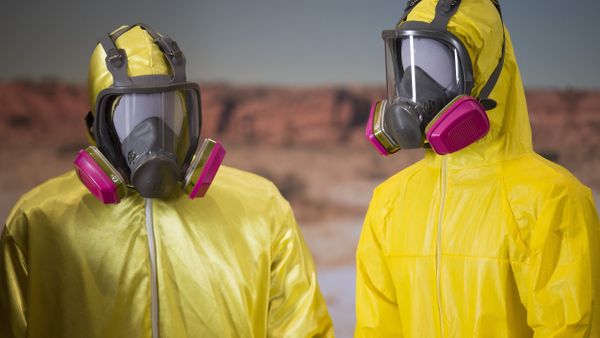 Two yellow Tyvek suits worn by Bryan Cranston and Aaron Paul in the AMC series Breaking Bad are displayed at the National Museum of American History in Washington, DC, November 10, 2015, during a memorabilia donation ceremony. - Sputnik International