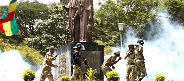 Police fire tear gas to disperse protesters during Irreecha, the thanks giving festival of the Oromo people in Bishoftu town of Oromia region, Ethiopia, October 2, 2016. Police fire tear gas to disperse protesters during Irreecha, the thanks giving festival of the Oromo people in Bishoftu town of Oromia region, Ethiopia, October 2, 2016. - Sputnik International